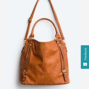 Faux leather crossbody bag. Lots of pockets!
